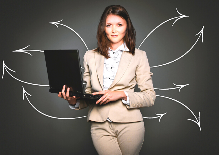 Woman holding a computer